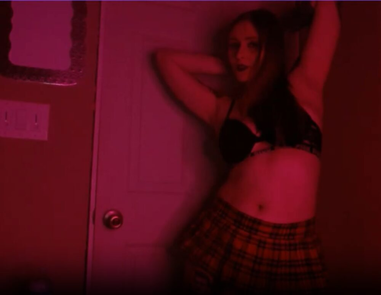 Lita Von Doom Posing Red Plaid