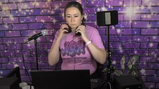 Jessica080806 Sunday Mix putting on my headphones pink NGR Music tee shirt