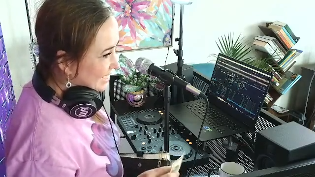 smiling talk during house music dj mix set